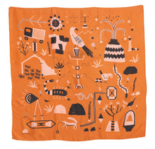 Load image into Gallery viewer, El Sueño Silk Scarf. Orange base colour with pink and navy printed imagery. Imagery depicts animals and ruins with a volcanic landscape.